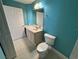 Bathroom features a marble countertop with a sink, with a white door at 2300 N Atlantic Ave # 1502, Daytona Beach, FL 32118