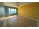Bedroom with stunning ocean view, ceiling fan, and luxury vinyl floors at 2300 N Atlantic Ave # 1502, Daytona Beach, FL 32118