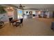 Expansive common area with a bar, seating, games, and a cozy atmosphere for residents to gather and socialize at 2300 N Atlantic Ave # 1502, Daytona Beach, FL 32118