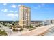 Coastal building showcasing ocean views and proximity to the sandy beach at 2300 N Atlantic Ave # 1502, Daytona Beach, FL 32118
