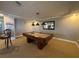 Recreation area with a pool table, seating, and a view of other areas creates a space for relaxation and entertainment at 2300 N Atlantic Ave # 1502, Daytona Beach, FL 32118