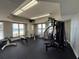 A fully-equipped gym features weight machines, free weights, and ocean views from the windows at 2300 N Atlantic Ave # 1502, Daytona Beach, FL 32118