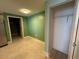 Spacious area off the kitchen area with a closet and doorway to another room in the home at 2300 N Atlantic Ave # 1502, Daytona Beach, FL 32118