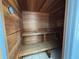 Private sauna with wooden benches and paneling offers a relaxing retreat for rejuvenation and wellness at 2300 N Atlantic Ave # 1502, Daytona Beach, FL 32118