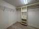 Spacious walk-in closet with custom shelving and ample storage at 2300 N Atlantic Ave # 1502, Daytona Beach, FL 32118