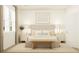 Inviting bedroom features neutral color palette, decorative pillows and contemporary accent furniture at 4536 Ochos Rios Pl, Kissimmee, FL 34758