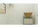 Clean laundry room features ample storage with wire shelving and a convenient rolling hamper at 4536 Ochos Rios Pl, Kissimmee, FL 34758