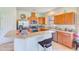 Well-equipped kitchen with stainless steel appliances, granite countertops, and ample cabinet space at 518 Cortez Dr, Davenport, FL 33837