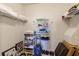 Spacious walk-in closet with wire shelving for optimal storage of clothing and accessories at 518 Cortez Dr, Davenport, FL 33837