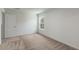 This is a cozy bedroom with natural light, neutral walls, and plush carpeting at 567 Bay Leaf Dr, Poinciana, FL 34759