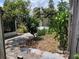 A backyard of the property showing the surrounding trees at 606 El Vedado Ave, Orlando, FL 32807