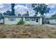 Charming single-story home with a covered carport at 606 El Vedado Ave, Orlando, FL 32807