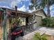 Exterior image of the storage shed with tools and lawn equipment at 606 El Vedado Ave, Orlando, FL 32807