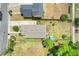 An aerial view showing the roof and backyard with surrounding neighborhood, close to amenities at 830 Polk St, Orlando, FL 32805