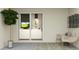 Cozy outdoor patio with seating, a view to the living room, and stylish decor at 2879 Transformation Way, Clermont, FL 34714