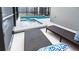 Relax and unwind in the private outdoor pool and hot tub area with comfortable patio furniture at 3008 Protagonist St, Kissimmee, FL 34746
