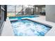 Soak in the sun by the pool and hot tub, all enclosed in a screened lanai for privacy at 3008 Protagonist St, Kissimmee, FL 34746