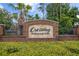 Crossing at Emerson Park entrance sign featuring brickwork, landscaping and a clear community marker at 1101 Pavia Dr, Apopka, FL 32703