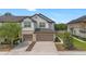 Charming townhome with well-kept landscaping, a two-car garage, and a cozy residential aesthetic at 1101 Pavia Dr, Apopka, FL 32703