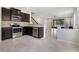 Well-designed kitchen flows into the living area, featuring stainless steel appliances at 1101 Pavia Dr, Apopka, FL 32703