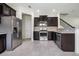 Kitchen features stainless steel appliances, granite countertops, and ample cabinet space at 1101 Pavia Dr, Apopka, FL 32703