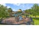 Community playground with slide, climbing structure, and nearby pool, creating a Gathering-friendly environment at 1101 Pavia Dr, Apopka, FL 32703