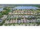 A high angle shot of a well developed neighborhood that features ponds and lakes at 14563 Bahama Swallow Blvd, Winter Garden, FL 34787