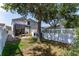 Large backyard features a screen patio with a lounge area at 14563 Bahama Swallow Blvd, Winter Garden, FL 34787