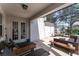 Comfortable covered patio with lounge furniture, perfect for relaxation and outdoor entertaining at 14563 Bahama Swallow Blvd, Winter Garden, FL 34787