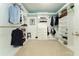 Spacious walk-in closet with custom shelving and ample storage space at 14563 Bahama Swallow Blvd, Winter Garden, FL 34787
