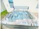 Close up of a modern hot tub with multicolor accents and many jets at 159 Lazy Willow Dr, Davenport, FL 33897