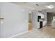 View of the kitchen featuring the appliances, cabinetry, and a view of the living area at 13219 Meadowlark Ln, Orlando, FL 32828