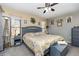 A primary bedroom featuring a large bed, soft lighting, and neutral colors at 640 Lake Dexter Cir, Winter Haven, FL 33884