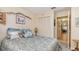 Comfortable bedroom featuring a closet, natural light, and relaxing decor at 640 Lake Dexter Cir, Winter Haven, FL 33884