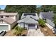 Charming single-Gathering home with solar panels, manicured landscaping, and an attached garage at 640 Lake Dexter Cir, Winter Haven, FL 33884