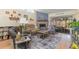 Cozy living room with a fireplace, comfortable seating, and a sliding door to outdoor space at 640 Lake Dexter Cir, Winter Haven, FL 33884