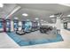 Modern gym with treadmills, elliptical machines, and fitness equipment for a complete workout experience at 8691 Sw 57Th Ln, Ocala, FL 34481