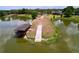 Aerial view of a pier on a lake, providing a scenic outdoor experience at 1634 Lady Bowers Trl, Lakeland, FL 33809