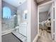 Bathroom featuring a tiled shower, modern vanity, sink, mirror, and stylish finishes at 1634 Lady Bowers Trl, Lakeland, FL 33809
