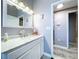 Bathroom featuring a modern vanity, sink, mirror, lighting, and stylish finishes at 1634 Lady Bowers Trl, Lakeland, FL 33809