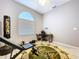Versatile bonus room with natural light, ideal for a home gym or office at 1634 Lady Bowers Trl, Lakeland, FL 33809