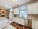 Well-lit kitchen featuring stainless steel appliances and granite countertops at 1634 Lady Bowers Trl, Lakeland, FL 33809