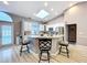 Kitchen with a large skylight, granite countertops, and stainless steel appliances at 1634 Lady Bowers Trl, Lakeland, FL 33809