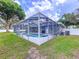 Screened pool with a covered lanai, offering a relaxing outdoor space at 1634 Lady Bowers Trl, Lakeland, FL 33809
