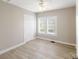 This is a cozy bedroom that has ample natural light and a ceiling fan at 1101 Dr Martin L King Jr Way, Haines City, FL 33844
