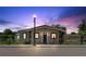 Charming home featuring a cozy front porch, meticulous landscaping, and a classic lamp post at 1101 Dr Martin L King Jr Way, Haines City, FL 33844
