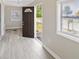 Bright, neutrally painted living room with durable flooring at 1101 Dr Martin L King Jr Way, Haines City, FL 33844
