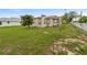 Expansive yard with lush greenery and a well-maintained lawn at 1101 Dr Martin L King Jr Way, Haines City, FL 33844