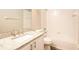 Bathroom features granite counters, tub, and shower with vanity storage at 2216 Heathwood Cir, Orlando, FL 32828