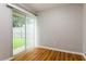 Bedroom features laminate flooring and sliding glass doors at 408 S Edgemon Ave, Winter Springs, FL 32708
